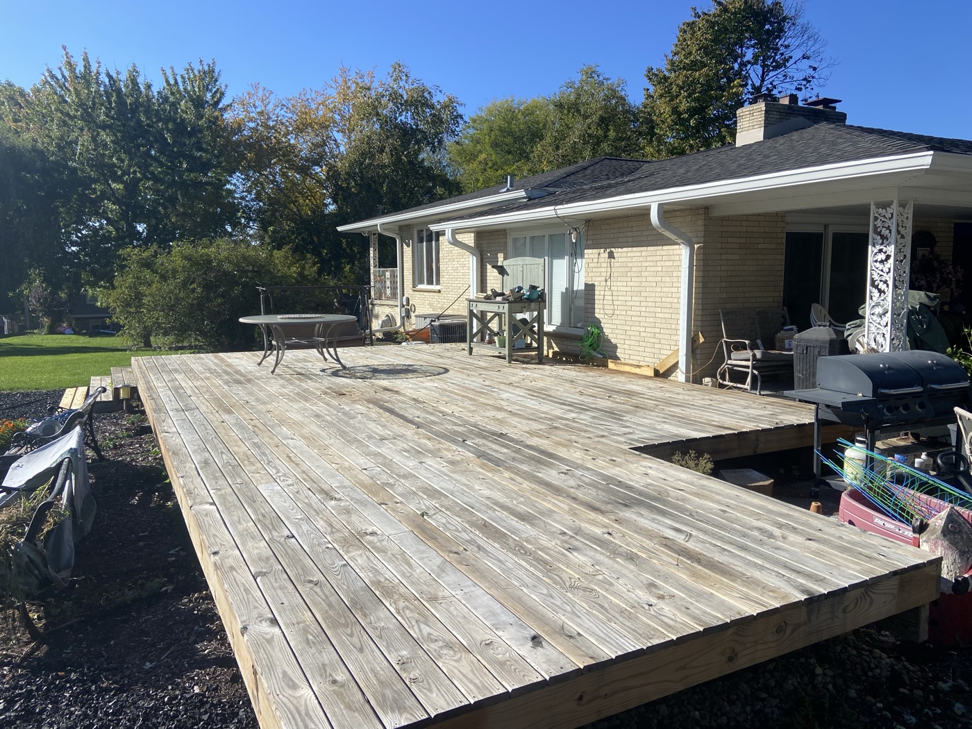 Weathered deck before professional prep and staining